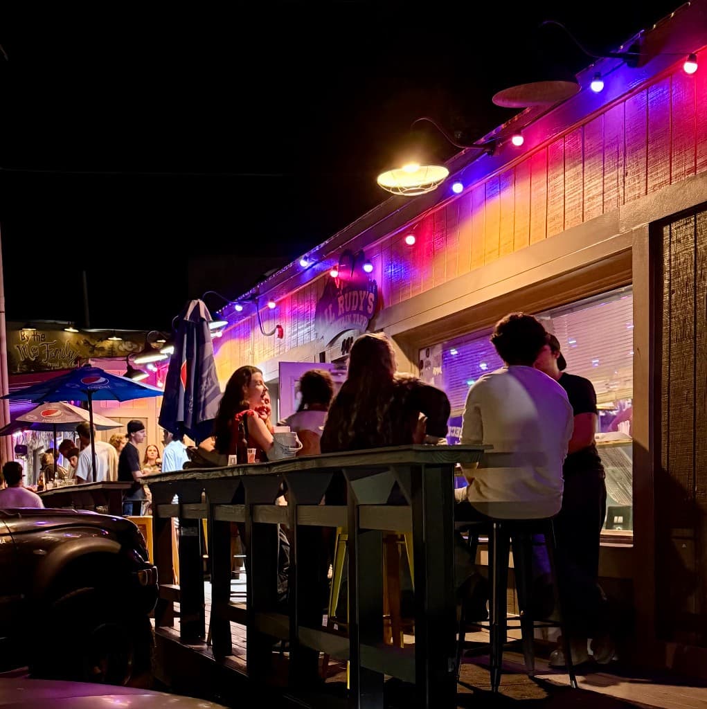 Night crowd on the patio at Lil Rudy's Mountain Tapp